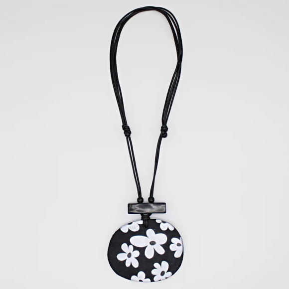 PAQUERETTE WHIMSICAL LEATHER PENDANT NECKLACE